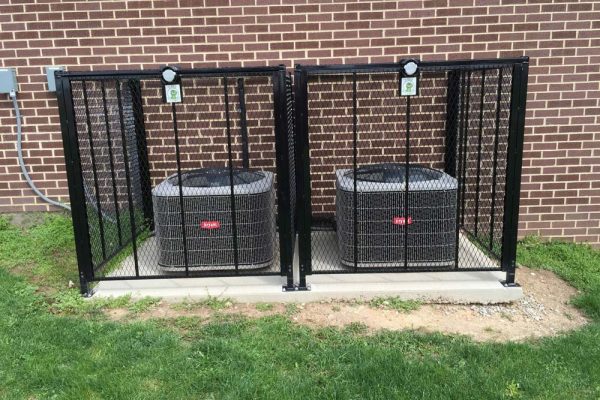 Bryant split system AC units with security cages in Springfield OH